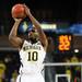 Michigan junior Tim Hardaway Jr. takes a shot during the second half of an NIT Season Tip-Off game at Crisler Center on Tuesday. Melanie Maxwell I AnnArbor.com